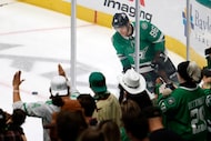 Dallas Stars right wing Mikko Rantanen (96) skates past fans during warmups before an NHL...