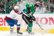 Dallas Stars center Matt Duchene (95) fights for the puck against Colorado Avalanche...
