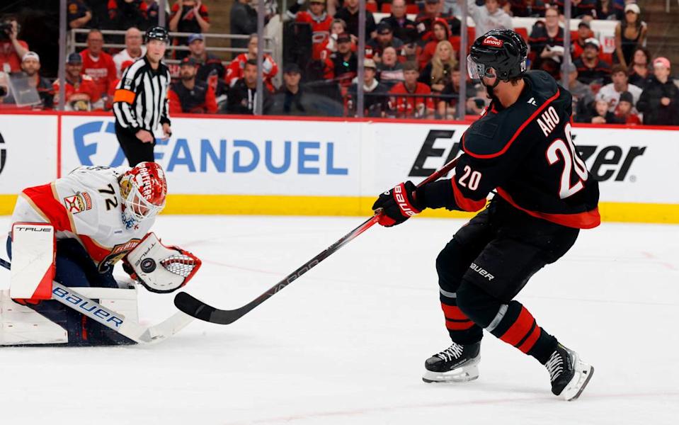 Panthers’ Sergei Bobrovsky (72) makes the save on a shot by Carolina’s Sebastian Aho (20) during the first period of the Carolina Hurricanes’ game against the Florida Panthers in Game 1 of the Eastern Conference Finals at the Lenovo Center in Raleigh, N.C., Tuesday, May 20, 2025.