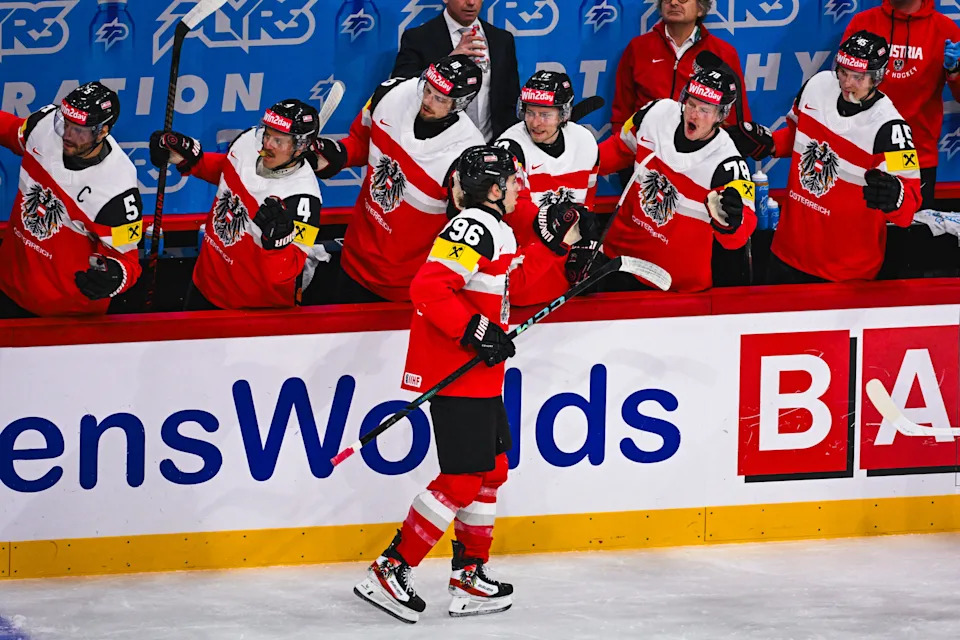 Austria forward Marco Kasper celebrates with his teammates during the IIHF Men's Ice Hockey World Championship match between Austria and Slovakia at Avicii Arena in Stockholm, on May 12, 2025.