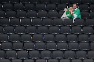 Dallas Stars fans sit in the stands after a 6-3 loss to the Edmonton Oilers in Game 5 of the...