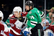 Dallas Stars left wing Jamie Benn (14) and Colorado Avalanche center Charlie Coyle (10)...