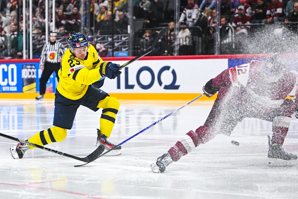 Sweden forward Lucas Raymond shoots to score during the IIHF Men's Ice hockey World Championship match between Latvia and Sweden in Stockholm, on May 14, 2025.