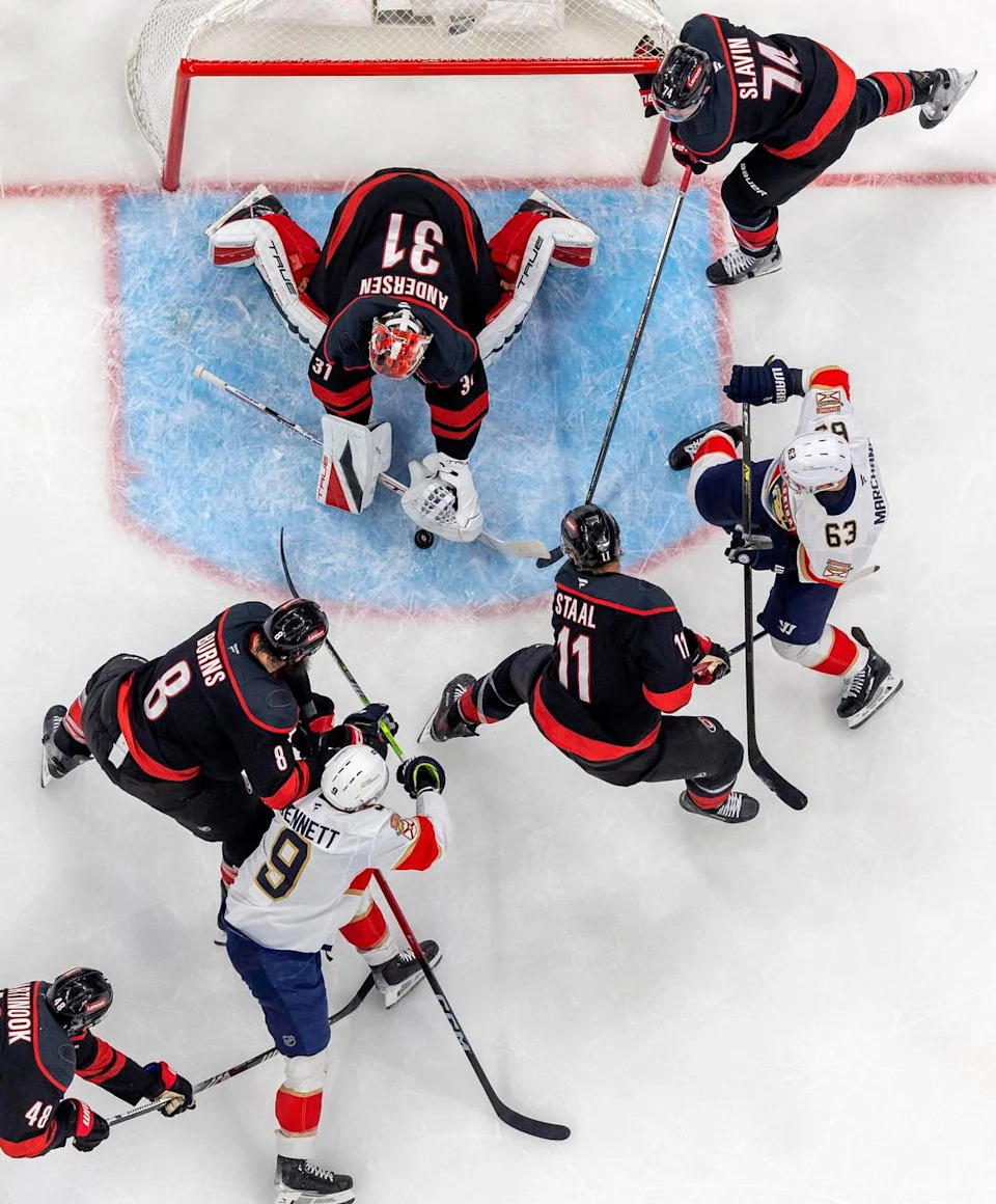 Carolina Hurricanes goalie Frederik Andersen (31) stops a scoring attempt by Florida Panthers center Sam Bennett (9) in the first period of their Stanley Cup series on Wednesday, May 28, 2025 at Lenovo Center in Raleigh, N.C. Robert Willett/rwillett@newsobserver.com