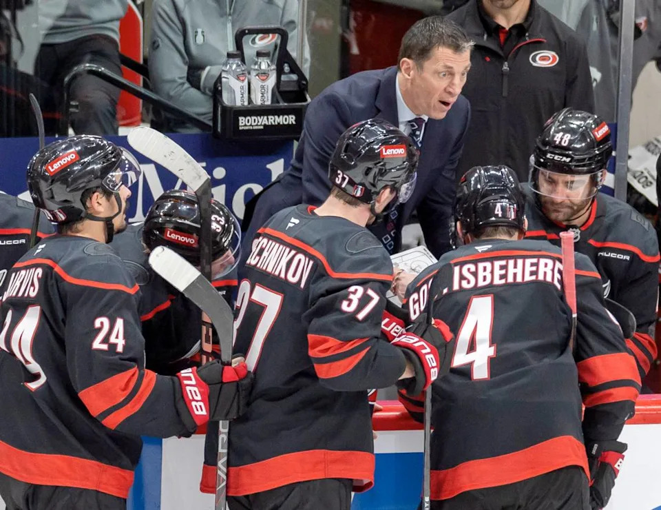 Carolina Hurricanes coach Rod Brind’Amour huddles with his players before a power play opportunity in the second period against the New Jersey Devils on Tuesday, April 29, 2025 at Lenovo Center in Raleigh, N.C.