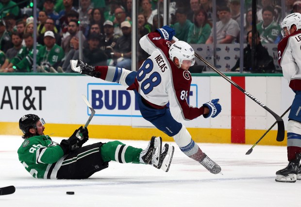 Matt Duchene (95) of the Dallas Stars and Martin Necas (88) of the Colorado Avalanche battle for the puck in the first period of Game 2 of their playoff series at American Airlines Center on April 21, 2025, in Dallas, Texas. (Photo by Richard Rodriguez/Getty Images)