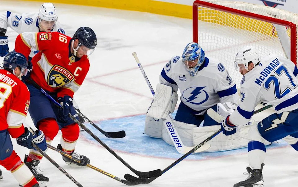 Tampa Bay Lightning goaltender Jonas Johansson (31), defenseman Ryan McDonagh (27), and defenseman Emil Lilleberg (78) defend against Florida Panthers center Aleksander Barkov (16) during the second period of an NHL game at Amerant Bank Arena in Sunrise, Fla., on Monday, Dec. 23, 2024.