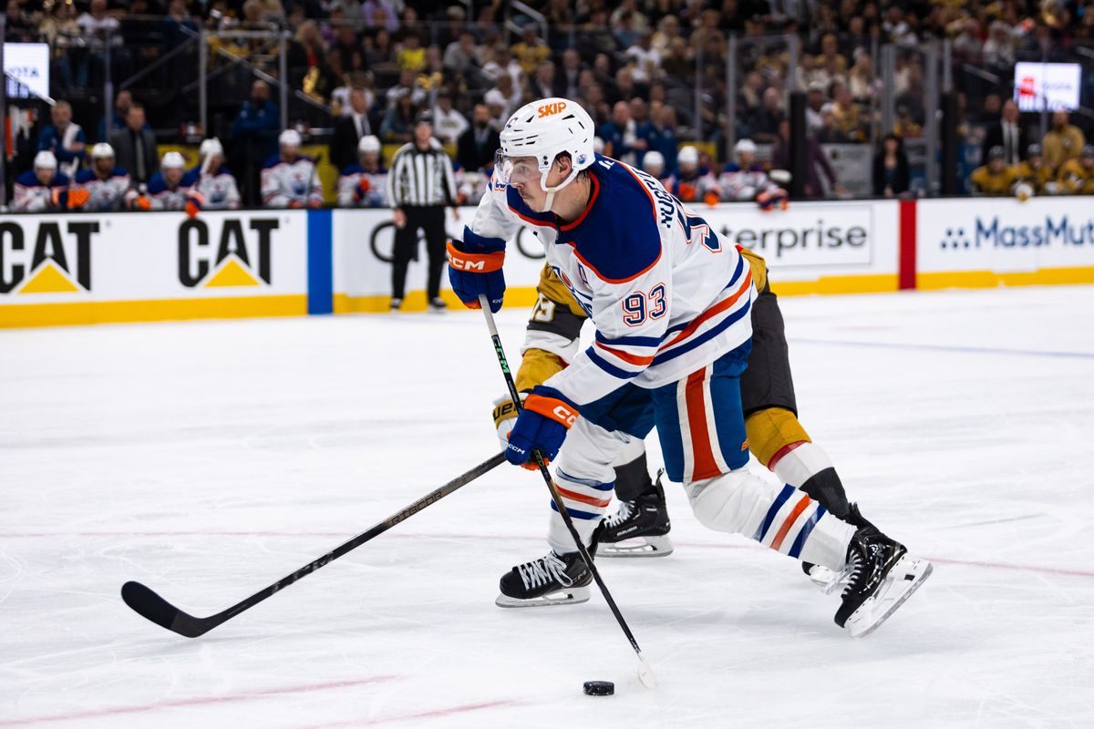 Edmonton Oilers center Ryan Nugent-Hopkins (93) shoots the puck during a NHL playoff game between the Las Vegas Golden Knights and the Edmonton Oilers, Wednesday May 14, 2025 in Las Vegas, Nev.