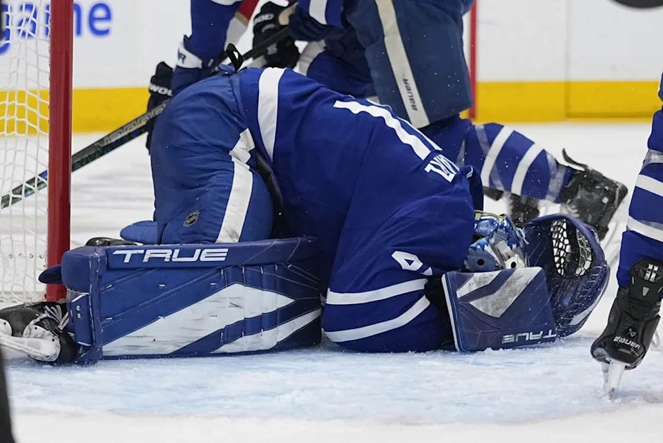 Toronto Maple Leafs goaltender Anthony Stolarz grabs his head after a collision with Florida Panthers forward Sam Bennett (not pictured) during the second period of Game 1 of their second-round series.John E&period; Sokolowski-Imagn Images