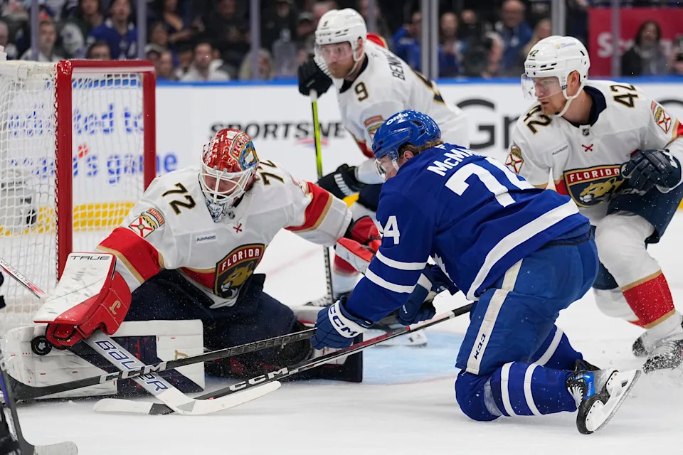 May 18, 2025; Toronto, Ontario, CAN; Florida Panthers goaltender Sergei Bobrovsky (72) makes a save on Toronto Maple Leafs forward Bobby McMann (74) as Florida Panthers defenseman Gustav Forsling (42) helps out during the first period of game seven of the second round of the 2025 Stanley Cup Playoffs at Scotiabank Arena. Mandatory Credit: John E. Sokolowski-Imagn Images
