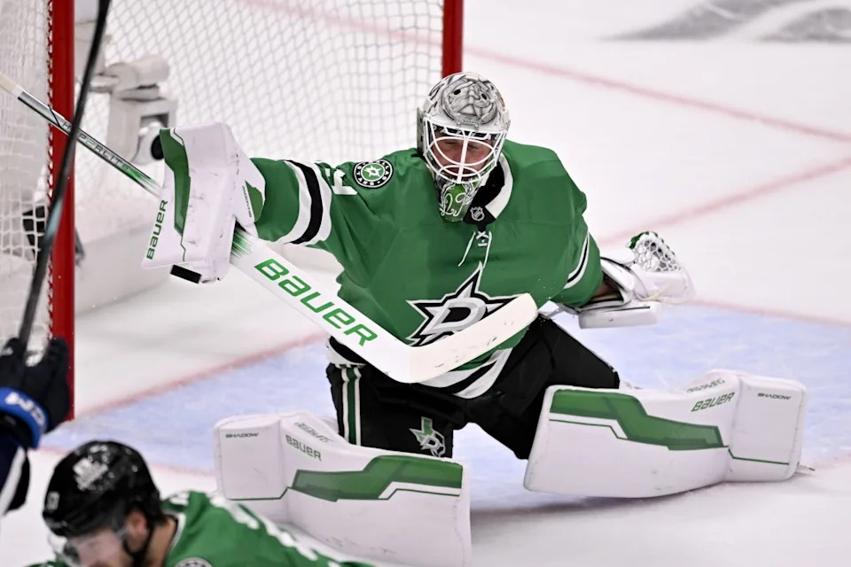 Dallas Stars goaltender Jake Oettinger (29) makes a save against the Winnipeg Jets during the 2025 Stanley Cup playoffs.Jerome Miron-Imagn Images