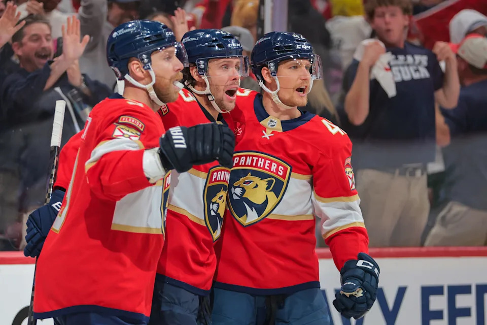 May 9, 2025; Sunrise, Florida, USA; Florida Panthers center Carter Verhaeghe (23) celebrates with center Sam Bennett (9) and defenseman Gustav Forsling (42) after scoring against the Toronto Maple Leafs during the second period in game three of the second round of the 2025 Stanley Cup Playoffs at Amerant Bank Arena. Mandatory Credit: Sam Navarro-Imagn Images
