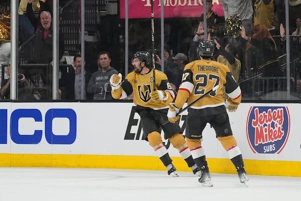 Vegas Golden Knights right wing Mark Stone (61) celebrates after scoring a second goal against the Edmonton Oilers during the first period of Game 1 of a second-round NHL hockey playoff series Tuesday, May 6, 2025, in Las Vegas. (AP Photo/John Locher)