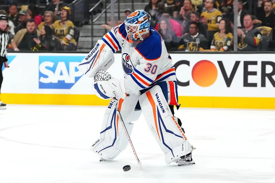 Edmonton Oilers goaltender Calvin Pickard (30) settles a dump in by the Vegas Golden Knights during the second period of game one of the second round of the 2025 Stanley Cup Playoffs at T-Mobile Arena.Stephen R. Sylvanie-Imagn Images