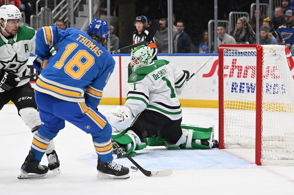 St. Louis Blues' Robert Thomas (18) is unable to score a goal past Dallas Stars' goaltender...