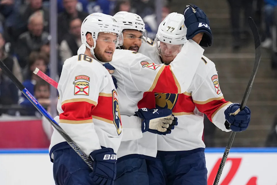 May 18, 2025; Toronto, Ontario, CAN; Florida Panthers defenseman Seth Jones (3) celebrates his goal against the Toronto Maple Leafs with Florida Panthers forward Aleksander Barkov (16) and defenseman Niko Mikkola (77) during the second period of game seven of the second round of the 2025 Stanley Cup Playoffs at Scotiabank Arena. Mandatory Credit: John E. Sokolowski-Imagn Images