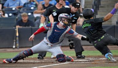 Minnesota Twins catcher Ryan Jeffers tags out Tampa Bay Rays' Jonathan Aranda (62) as Aranda trys to steal home during the second inning of a baseball game Tuesday, May 27, 2025, in Tampa, Fla. (AP Photo/Jason Behnken)