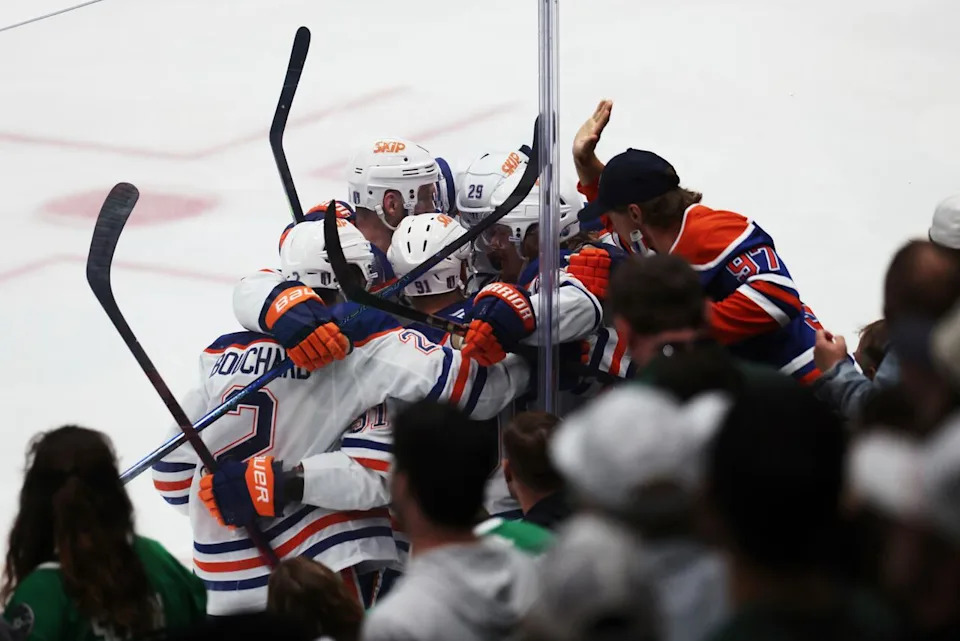 Edmonton Oilers players celebrate after left wing Evander Kane scored against the Dallas Stars during the third period of Game 5 of the Western Conference finals in the NHL hockey Stanley Cup playoffs, Thursday, May 29, 2025, in Dallas.