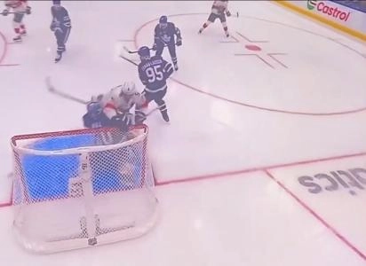 Aaron Ekblad delivers an elbow to the head of Joseph Woll