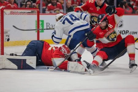 Toronto Maple Leafs forward Bobby McMann going hard towards the net against Florida Panthers goaltender Sergei Bobrovsky.