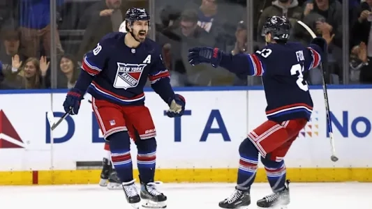 Chris Kreider and Adam Fox