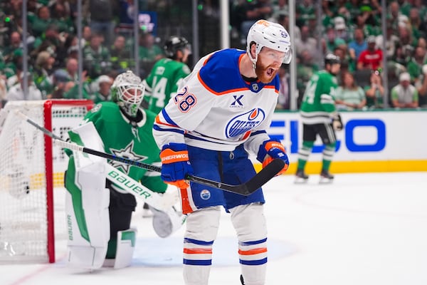 Edmonton Oilers right wing Connor Brown reacts after scoring a goal against the Dallas Stars during the second period in Game 2 of the Western Conference finals in the NHL hockey Stanley Cup playoffs, Friday, May 23, 2025, in Dallas. (AP Photo/LM Otero)