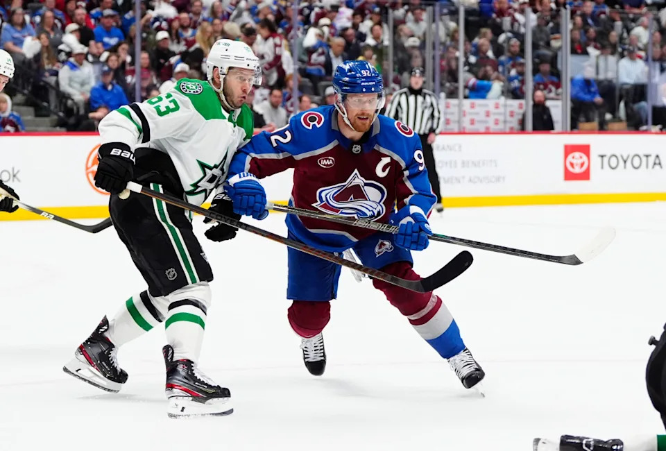 Dallas Stars' Evgenii Dadonov (63) and Colorado Avalanche's Gabriel Landeskog (92)Ron Chenoy-Imagn Images