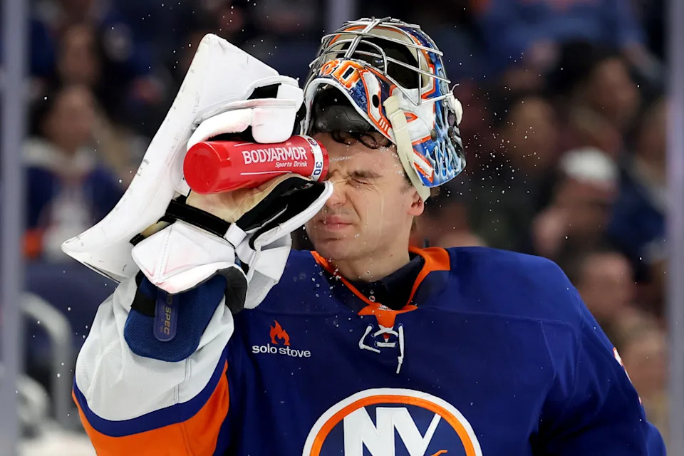 New York Islanders goaltender Ilya Sorokin (30) sprays water on his face at UBS Arena.Brad Penner-Imagn Images