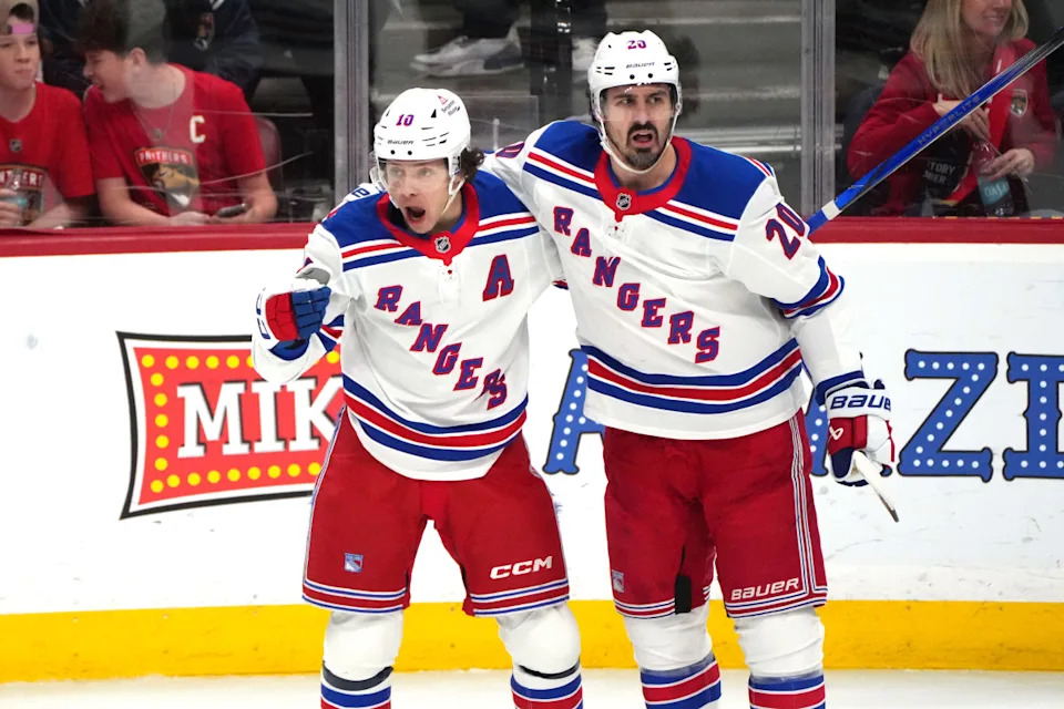 New York Rangers left wing Chris Kreider (20) celebrates a goal with Artemi Panarin (10).Jim Rassol-Imagn Images