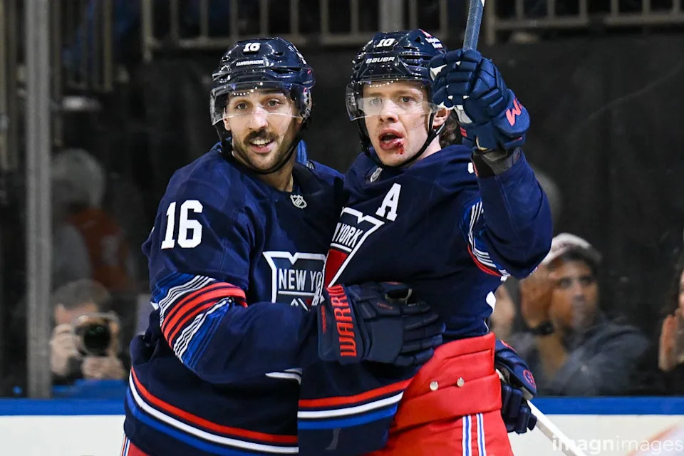 Apr 9, 2025; New York, New York, USA; New York Rangers left wing Artemi Panarin (10) celebrates a goal with center Vincent Trocheck (16) against the Philadelphia Flyers during the second period at Madison Square Garden.