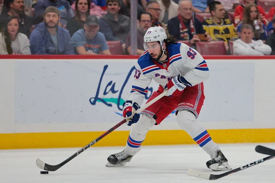 Apr 14, 2025; Sunrise, Florida, USA; New York Rangers center Mika Zibanejad (93) moves the puck against the Florida Panthers during the third period at Amerant Bank Arena.