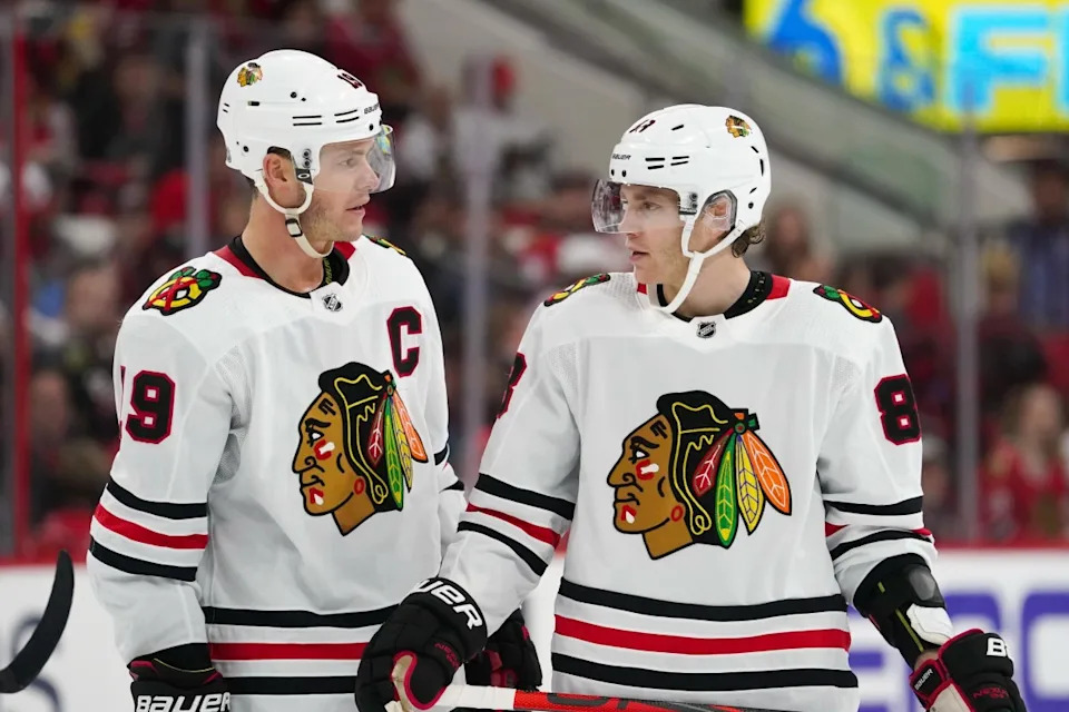 Chicago Blackhawks center Jonathan Toews (19) and right wing Patrick Kane (88) talk against the Carolina Hurricanes at PNC Arena. The Carolina Hurricanes defeated the Chicago Blackhawks 4-0.James Guillory-Imagn Images