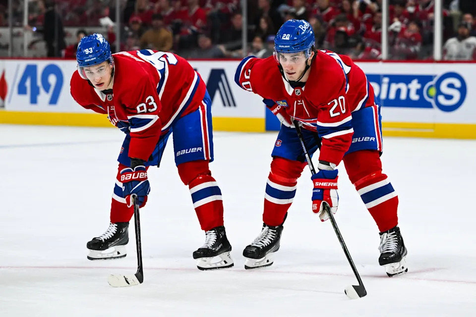 Montreal Canadiens right wing Ivan Demidov (93) and left wing Juraj Slafkovsky (20) wait for a face-off at Bell Centre.David Kirouac-Imagn Images