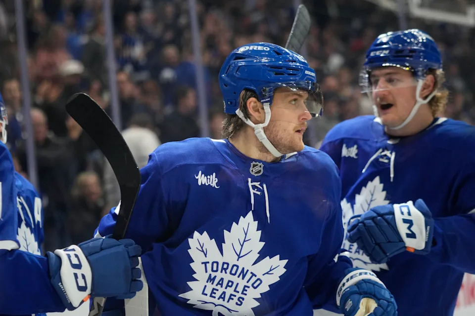 Toronto Maple Leafs forward Bobby McMann (74) congratulates forward William Nylander (88) after scoring a goal.John E&period; Sokolowski-Imagn Images