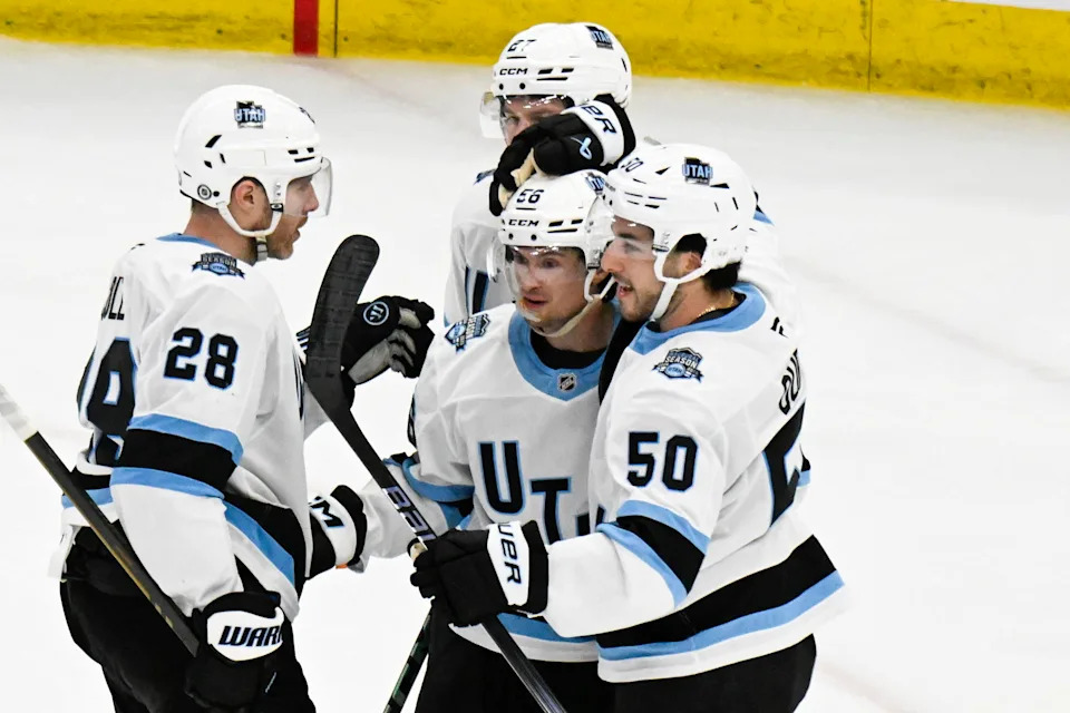 Mar 30, 2025; Chicago, Illinois, USA; Utah Hockey Club right wing Kailer Yamamoto (56), 2nd from right, celebrates with teammates after scoring a goal against the Chicago Blackhawks during the third period at United Center. Mandatory Credit: Matt Marton-Imagn Images