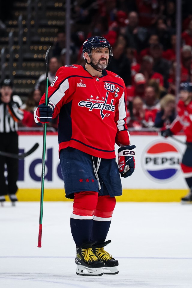 Alex Ovechkin #8 of the Washington Capitals reacts during a hockey game.