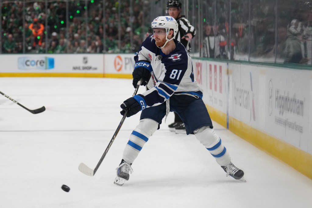 Winnipeg's Kyle Connor passes a puck during Game 3.
