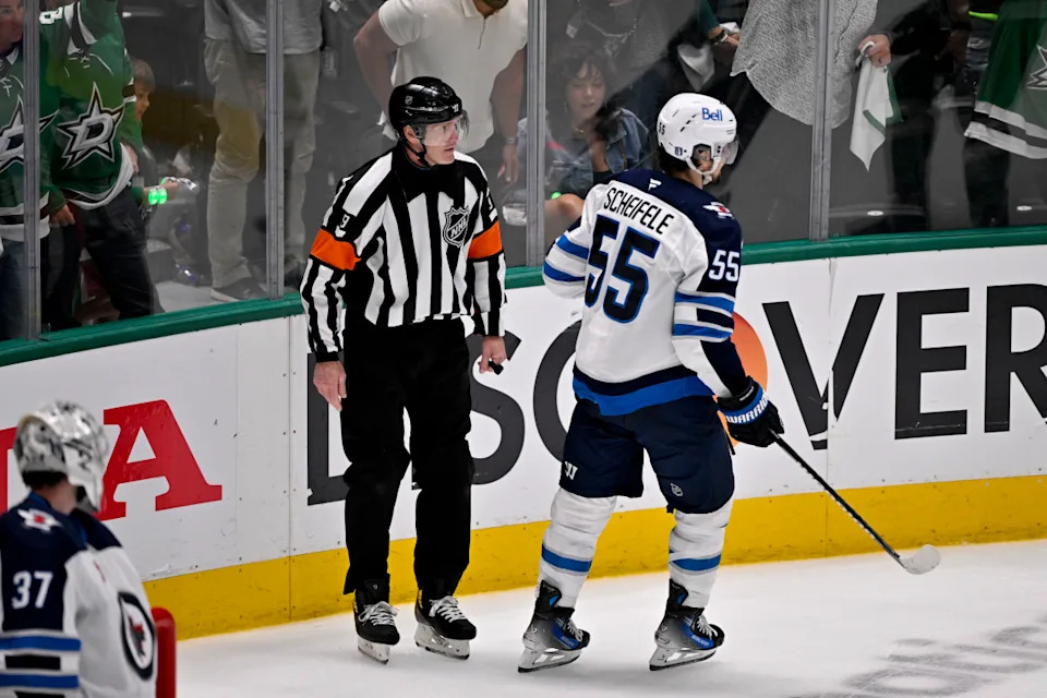 Winnipeg Jets center Mark Scheifele (55) is called for tripping on Dallas Stars center Sam Steel.Jerome Miron