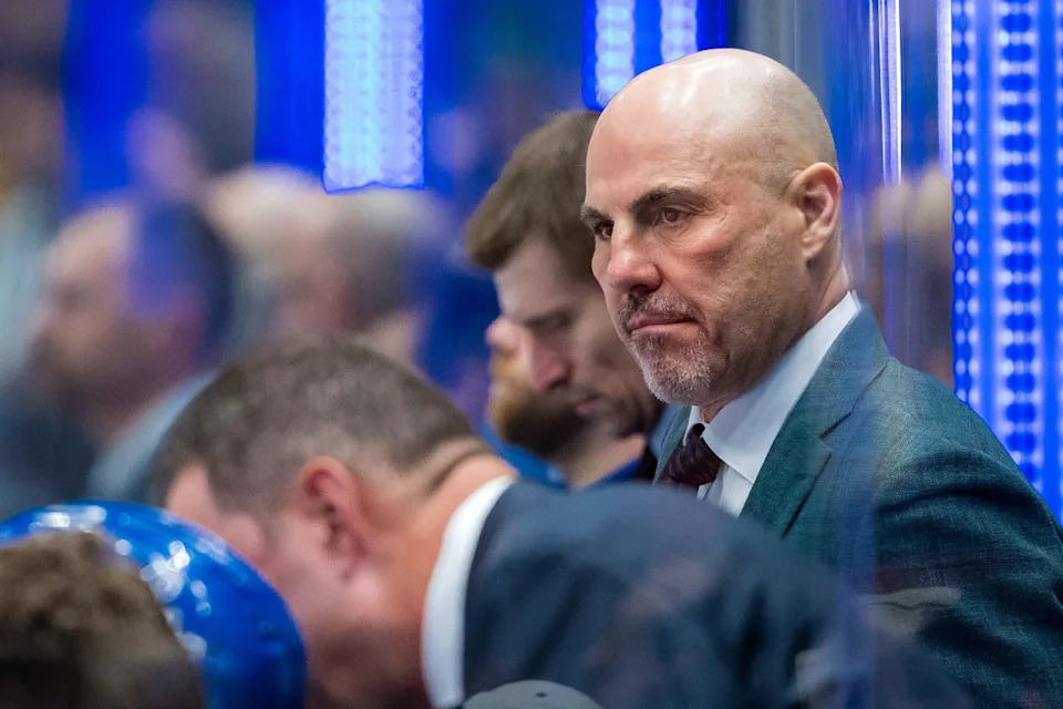 Vancouver Canucks head coach Rick Tocchet on the bench against the Calgary Flames.Bob Frid-Imagn Images
