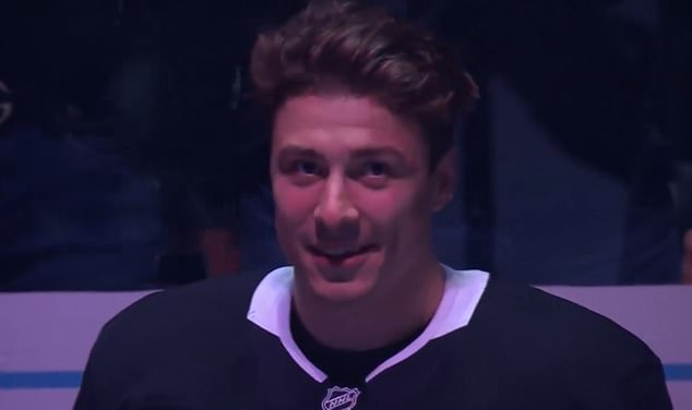 Cameras caught Kings forward Andrei Kuzmenko smiling as the musicians performed