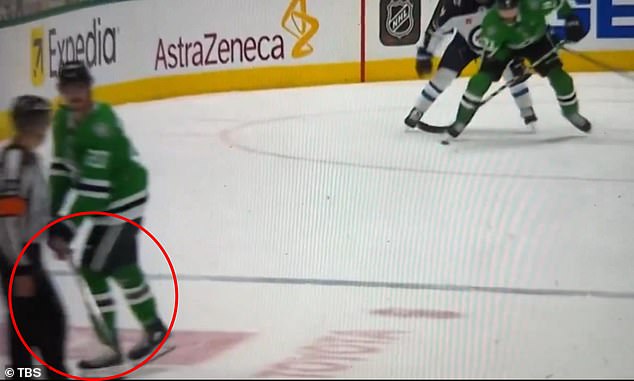 He then approached the ref and in a moment of madness struck him in the shin with his stick