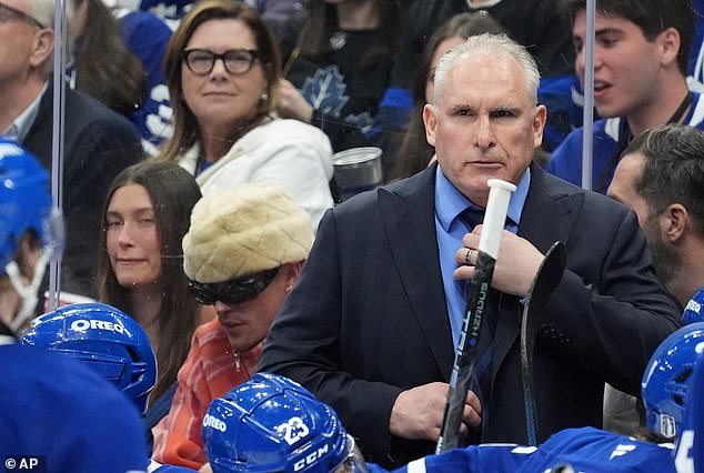 In another photo, Justin tensely leaned forward with his sunglasses covering his eyes while Hailey displayed a stone-faced expression