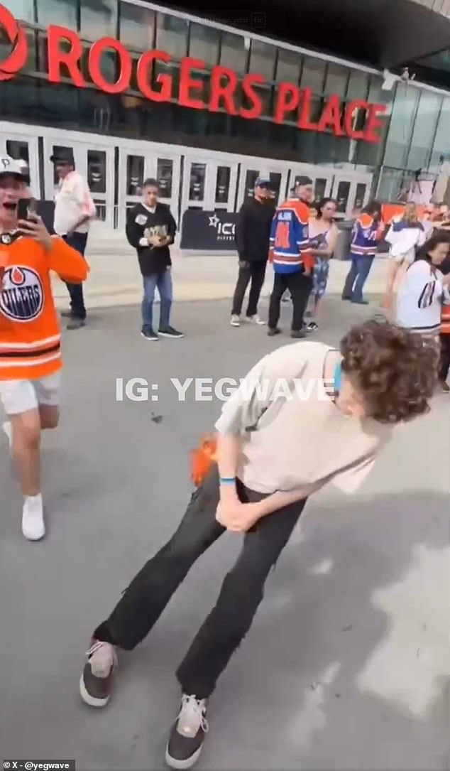 An Edmonton Oilers fan got slapped and knocked unconscious by a fellow fan on Thursday