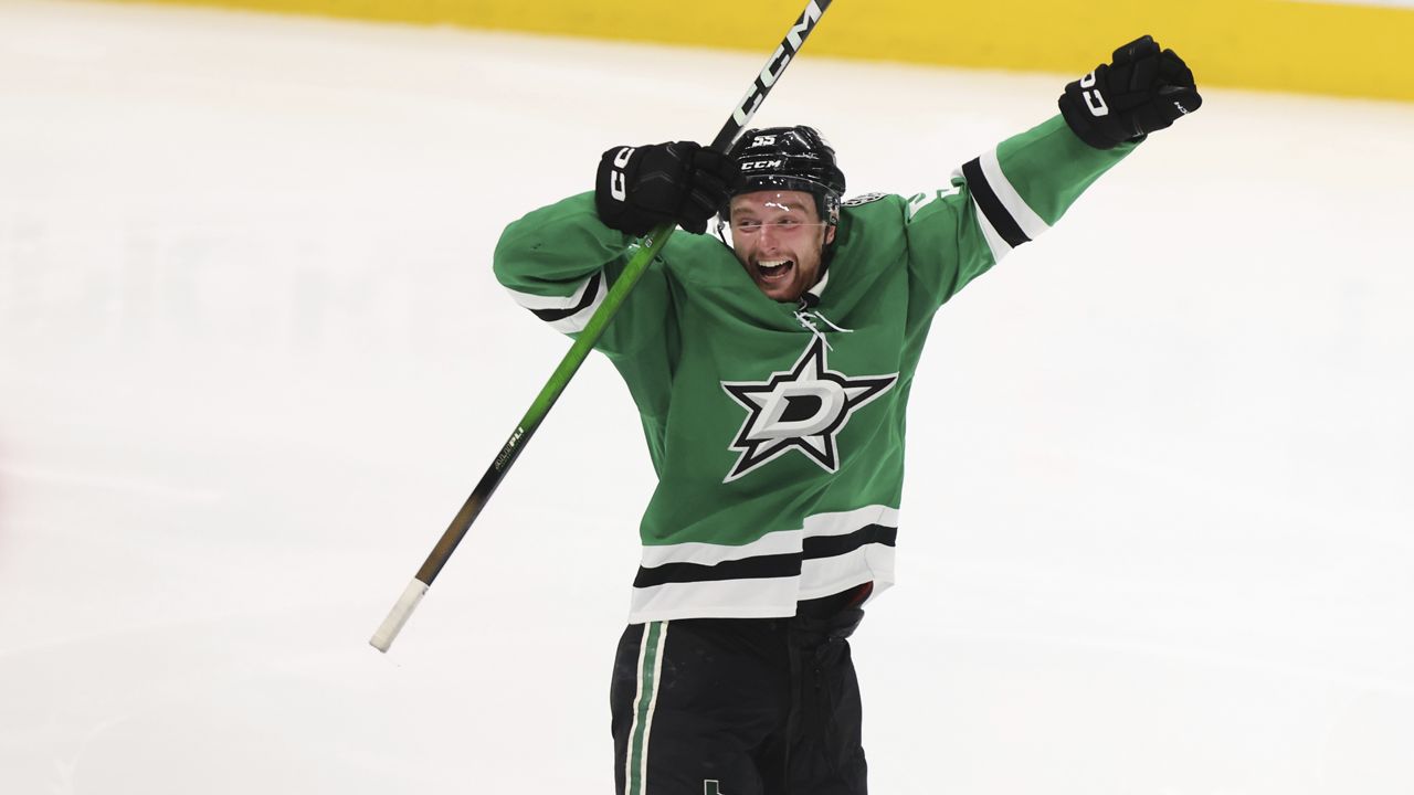 Dallas Stars' Thomas Harley celebrates after scoring in overtime in Game 6 of a second-round NHL hockey playoff series against the Winnipeg Jets in Dallas, Saturday, May 17, 2025. (AP Photo/Gareth Patterson)