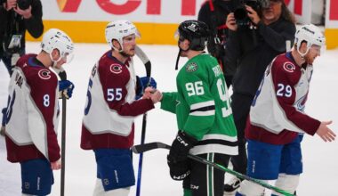 Colorado Avalanche's Cale Makar (8), Ryan Lindgren (55) Dallas Stars' Mikko Rantanen (96) and Nathan MacKinnon (29) exchange handshakes after the Stars 4-2 win in Game 7 of a first-round NHL hockey playoff series Saturday, May 3, 2025, in Dallas. (AP Photo/Julio Cortez)