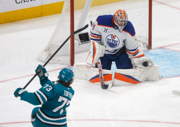 Edmonton Oilers goaltender Stuart Skinner (74) blocks a shot by...