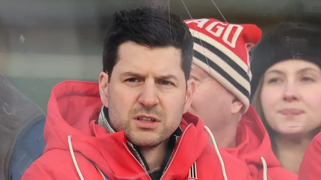General manager Kyle Davidson of the Chicago Blackhawks looks on during practice prior to the 2024 NHL Winter Classic against the St. Louis Blues at Wrigley Field on December 30, 2024 in Chicago, Illinois.