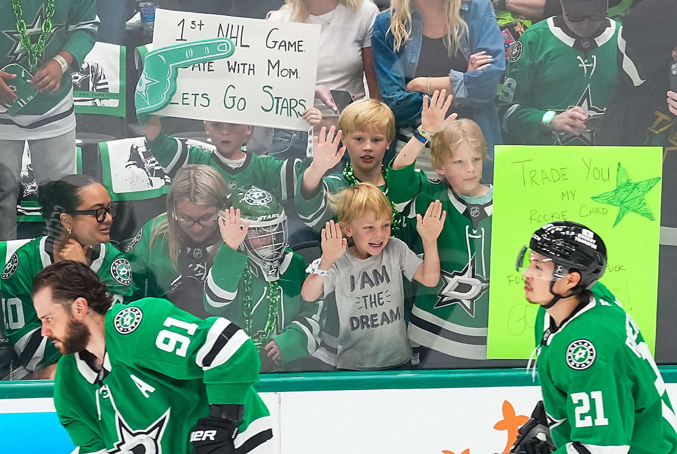 Dallas Stars fans cheer center Tyler Seguin (91) and left wing Jason Robertson (21) as the...