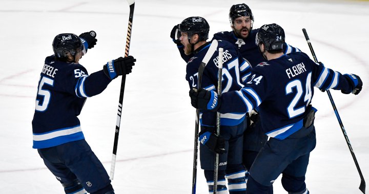 Hellebuyck shines as Winnipeg Jets tie up series with 4-0 Game 2 victory - Winnipeg