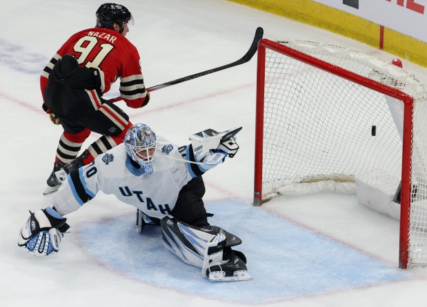 Blackhawks center Frank Nazar (91) scores a penalty shot past Utah goaltender Karel Vejmelka on March 7, 2025, at the United Center. (John J. Kim/Chicago Tribune)
